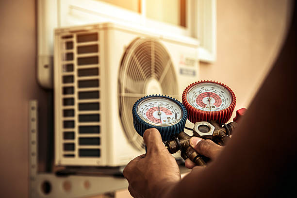 Professional Heat Pump Repair technician working in Arock, OR